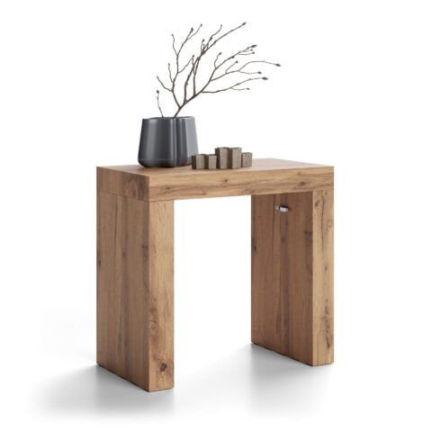 Evolution – transformējams konsoles galds (Gaiši brūns, made in Italy)  Elegants konsoles galds, kas dažās sekundēs pārvēršas par pilna izmēra ēdamgaldu līdz pat 305 cm garumā. Ideāls risinājums mājokļiem, kur svarīga ir gan telpas ekonomija, gan iespēja uzņemt daudz viesu.